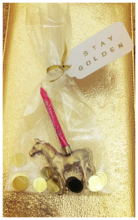 Party favor: Golden Stallion birthday candle holder!